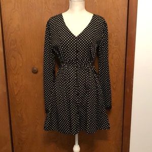 American Rag polka dot dress with buttons down the front and flared sleeves.